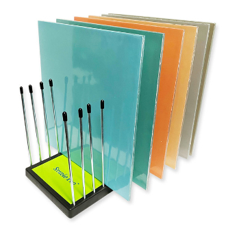 A holder with a Studio Pro Organizer 15 with a variety of different colored brushes.