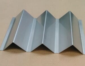 A set of Stainless Triangle Pattern Bar / Slumpers on a table.