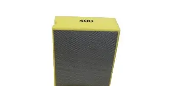 A yellow box with a 400 Grit Diamond Hand Pad inside.