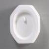 Octagonal white ceramic dish on gray background.