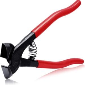 Red-handled tile nipper tool.